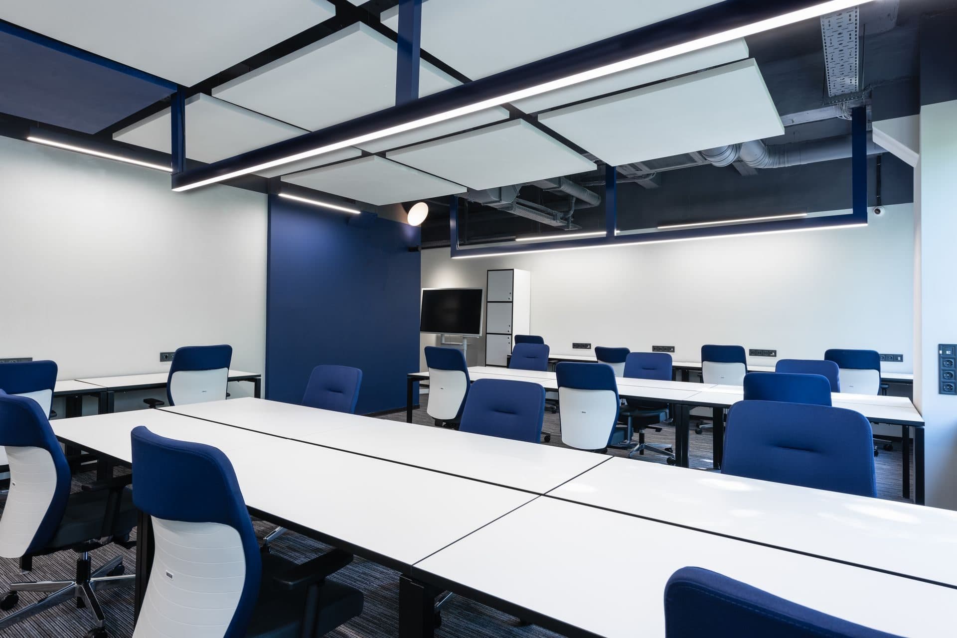 A freshly painted open-plan office with clean walls, ready for the workday
